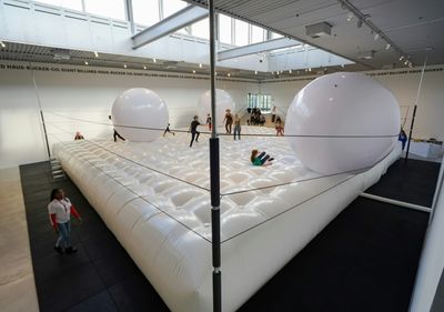 'Human billiards' installation rolls into Danish museum