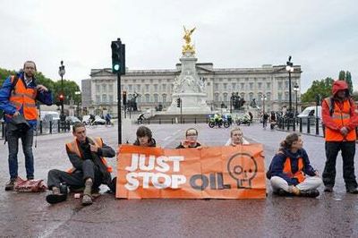 Just Stop Oil protesters block off The Mall outside Buckingham Palace