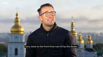 Watch: Moment BBC journalist ducks as explosions rock Kyiv