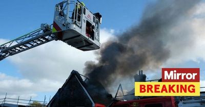 Huge fire at primary school sparks evacuation of students as part of roof collapses