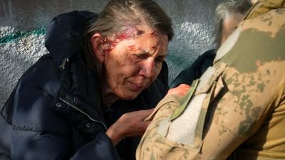 Ukrainian civilians take shelter as Russia targets cities, infrastructure far from frontline