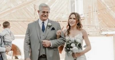 Bride angrily tells guests to 'put phones away' as she walks down wedding aisle
