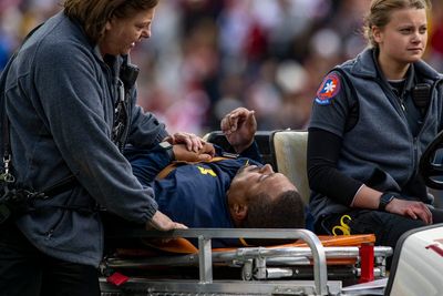 Michigan's Hart back from hospital after medical emergency
