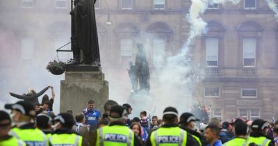 Rangers fan lashed out and spat at police officers during George Square celebrations