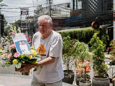 A father's farewell to daughters in Bali