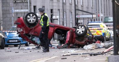 Man and woman rushed to hospital as car flips onto roof after horror crash in Aberdeen