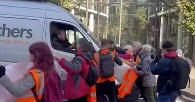 White van man ploughs through Just Stop Oil protesters as drivers beg them to move