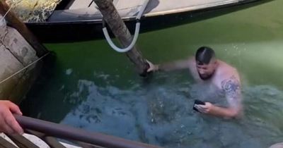 Irish tourist who dropped iPhone in Venice canal strips off and dives in to get it