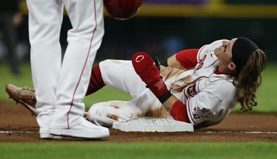 Why MLB players wear oven mitt gloves on their hands while running the bases