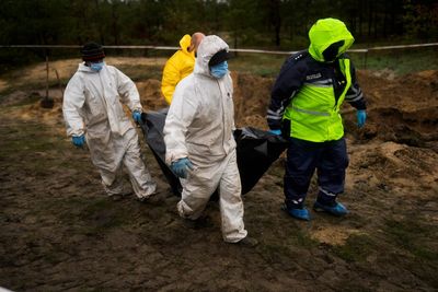Bodies exhumed from mass grave in Ukraine's liberated Lyman
