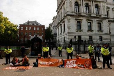 Just Stop Oil protesters blockade road outside Downing Street in 12th day of action