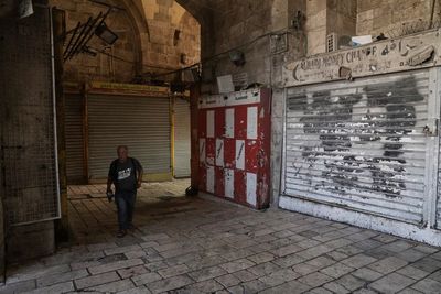 Palestinians strike in east Jerusalem over police raids