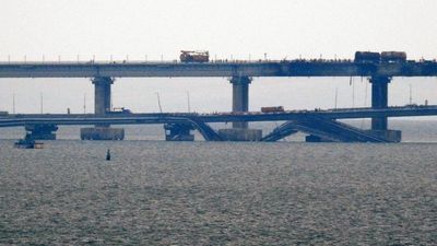 Russia arrests 8 people for the blast on a Crimea bridge as Ukraine denies involvement