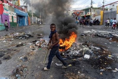 US offers help for troubled Haiti but cautious on troops