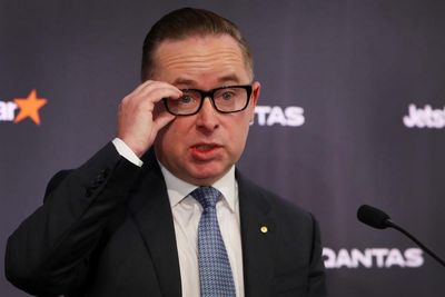 Alan Joyce predicts underlying profit of up to $1.3bn and denies Qantas has a morale problem