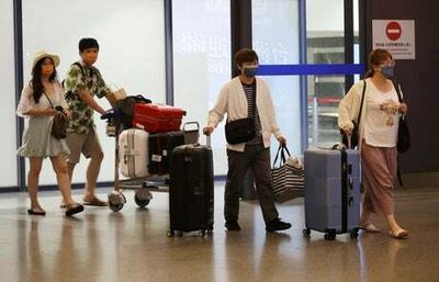 Tourists come back to Taiwan after strict Covid-19 restrictions eased