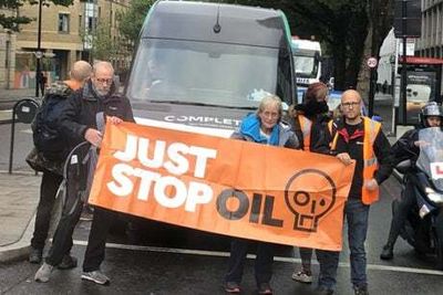 Just Stop Oil activists block St George’s Square roundabout on 13th day of London protests