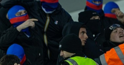 Liverpool fans shout pro-IRA chant as Rangers 'ultras' in balaclavas try to charge away end at Ibrox