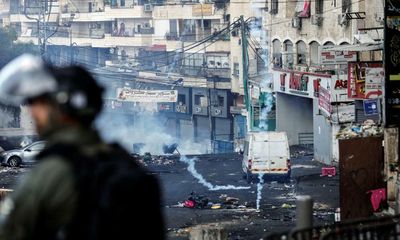 Israeli forces use live fire in clashes with Palestinian protesters in Jerusalem