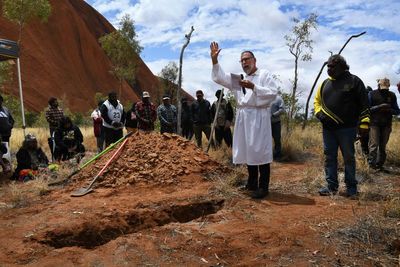 Aboriginal man laid to rest in moving ceremony 90 years after he was killed by police at Uluru