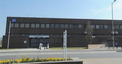 Man arrested after walking into Lanarkshire police station with blade