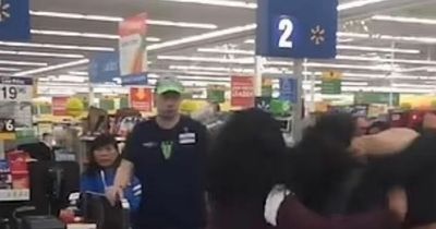 Chaos at Walmart self-checkout as 25 customers start fighting in mass brawl