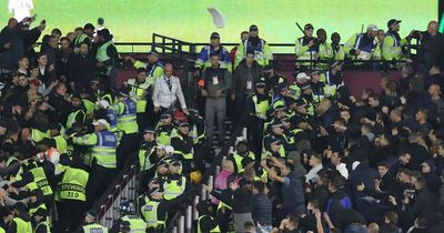 Riot police called in as West Ham fans pelted with flares and seats at London Stadium