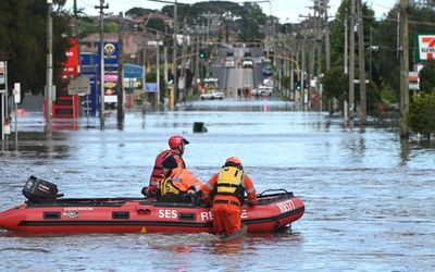 ‘River has swallowed the street’: Rescues in Melbourne as floods worsen