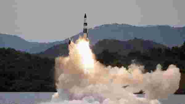 North Korea fires missile, flies warplanes near border as South imposes sanctions