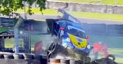 Horror footage emerges of £170k Porsche landing above race marshal in 100mph crash