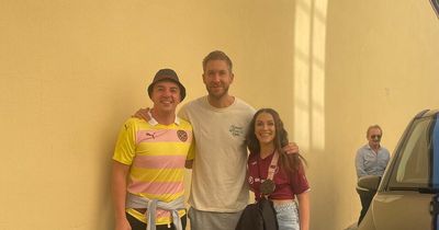 Superstar DJ Calvin Harris poses with Hearts fans in Florence for Fiorentina match