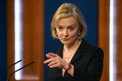 Liz Truss ‘hanging by a thread’ as PM, says Lord Hague, after corporation tax U-turn and axing of chancellor