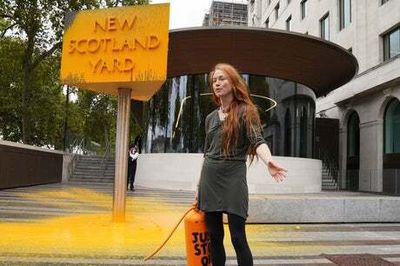 Just Stop Oil activists arrested as Met Police HQ sprayed with orange paint