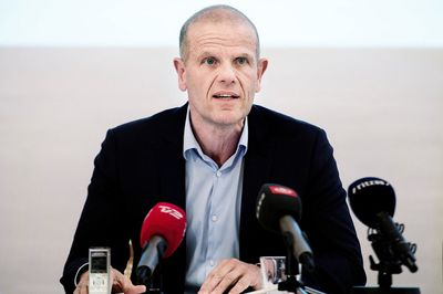 Danish government backs probe into spy chief scandal