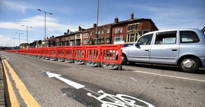 Battered temporary cycle lanes to be permanently installed across Liverpool