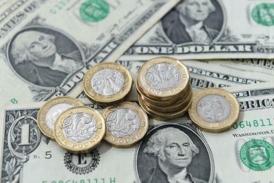 Pound falls further and bonds under pressure despite Government tax U-turn