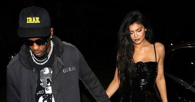 Kylie Jenner turns heads in vinyl LBD as she holds hands with Travis Scott on dinner date