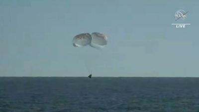 SpaceX ferries astronauts back to Earth after half-year away
