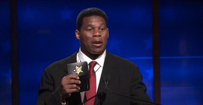 Herschel Walker called out for ‘prop’ badge during debate when accused of lying about working as a sheriff