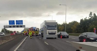 Emergency services rush to scene of two-car crash on M50