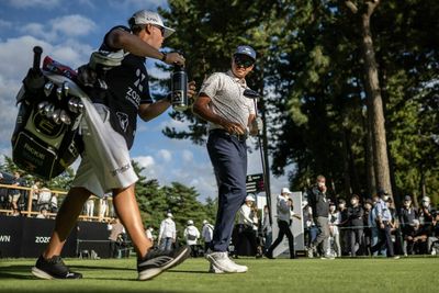 After locking up the 54-hole lead, Rickie Fowler stayed late to sign autographs at Zozo Championship