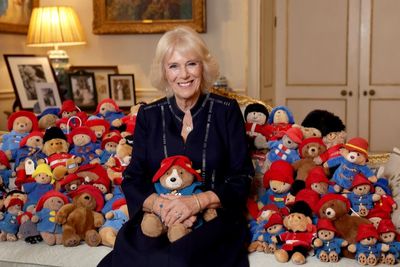 Camilla surrounded by Paddingtons as tributes to Queen donated to Barnardo’s