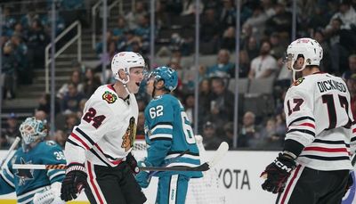 Blackhawks rally past Sharks for first win of season