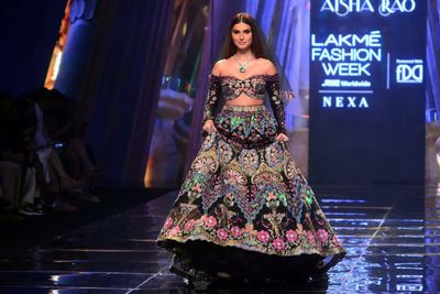 Tara Sutaria stuns in an embellished lehenga with an off-shoulder choli