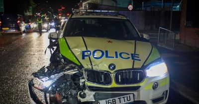 Armed response police BMW badly damaged in crash on 999 call