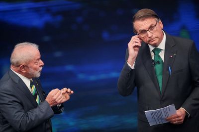 Brazil's Bolsonaro and Lula spar in first debate of runoff campaign