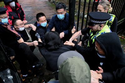 Probe after Hong Kong protesters attacked at China UK consulate