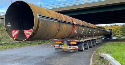 Police stop lorry on the M4 carrying huge 50-metre long load hanging off the back