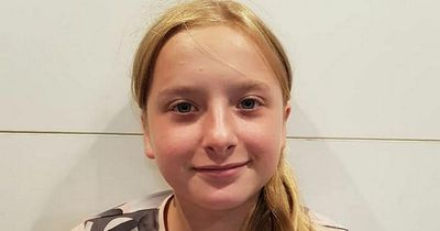 Woman charged with murder and rape of schoolgirl, 12, found inside suitcase