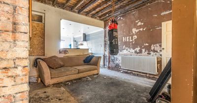 The run-down house with 'help' scribbled across the wall sold for £37,500